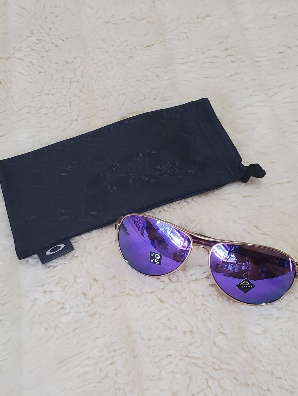 Oakley Women’s Gold Frame Sunglasses with Purple Mirrored Lenses